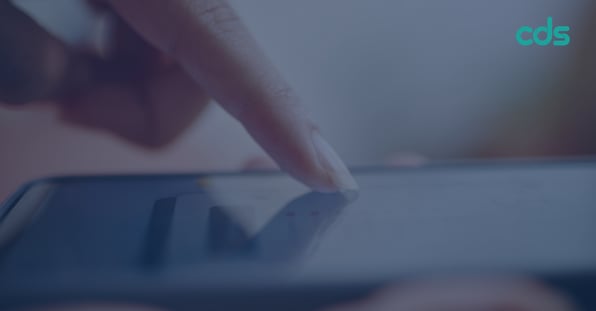 Image of someone putting their finger on a touchscreen tablet