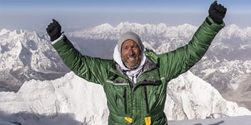 Ben Fogle on the top of a mountain