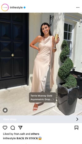 A screenshot of an In The Style Instagram post showing that the outfit is tagged and a 'Shop Now' button across the bottom of the page.